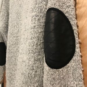 Sweater with cute elbow detail.